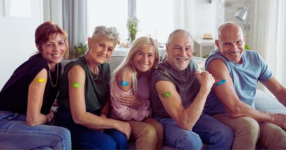 Five people with bandages over vaccination spots - Addressing Vaccine Hesitancy